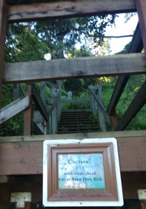 sign at bottom of steps